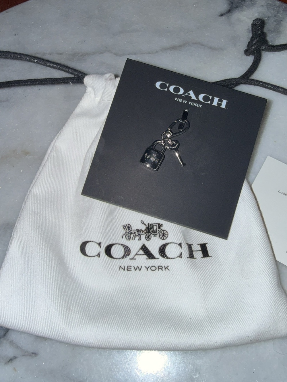 ***SOLD**


NWT Coach Padlock & Key Charm w/ Dust-Bag - Picture 3 of 6
